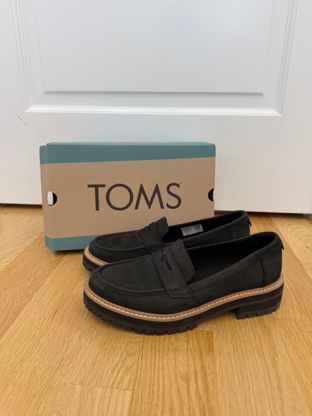 TOMS Cara Black Penny Loafers with Tan Welt